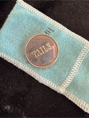 Vintage sterling silver "Heads or Tails" coin produced by Tiffany & Co.